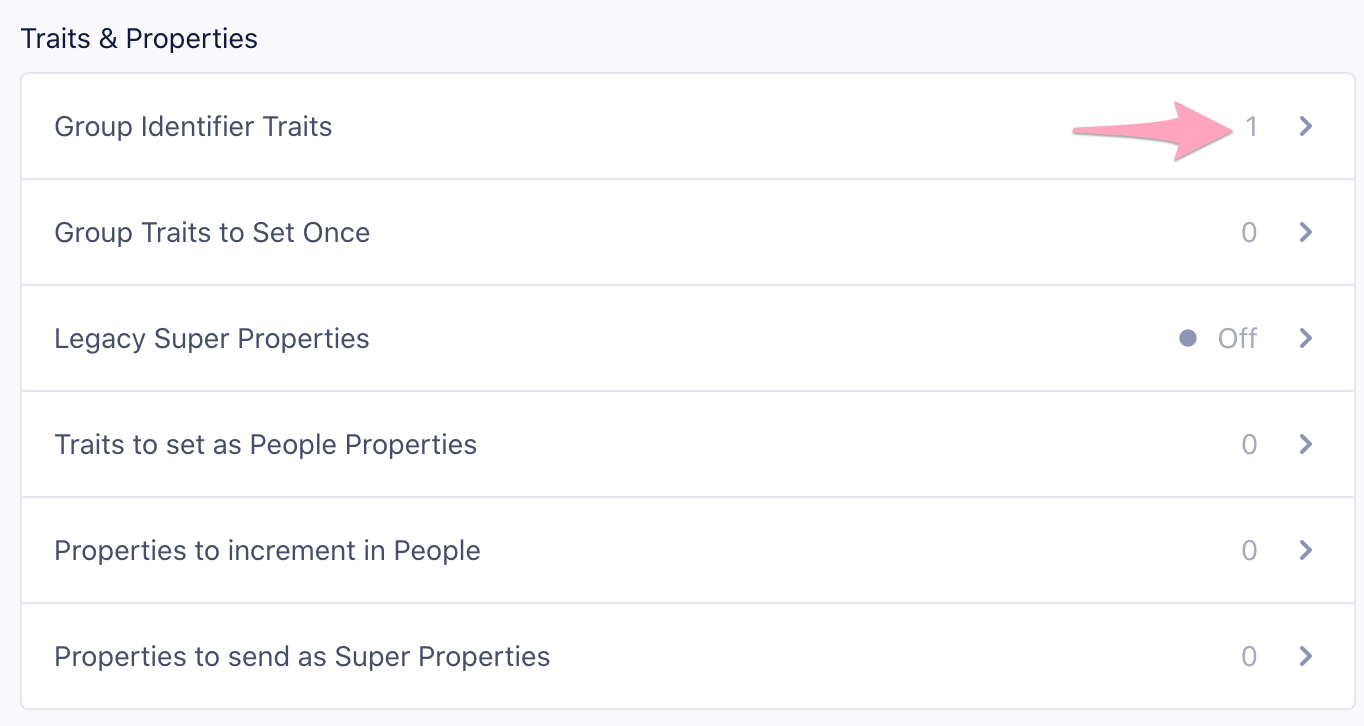 Screenshot of the Mixpanel dashboard, showing the “Group Identifier Traits” field where one or more traits (like company_id) can be defined for grouping users.
